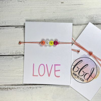 INSPIRATIONAL BRACELET - Handmade by Brandy Bell Design <br> Adjustable Waxed Cotton  "LOVE" (coral)