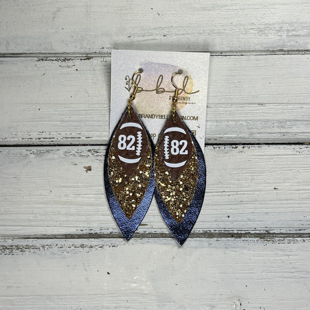 (CUSTOM) DOROTHY -  Leather Earrings  ||    <BR> BROWN (FAUX LEATHER) FOOTBALL WITH CUSTOM NUMBER,<BR>GOLD GLITTER (FAUX LEATHER), <BR> METALLIC NAVY BLUE SMOOTH
