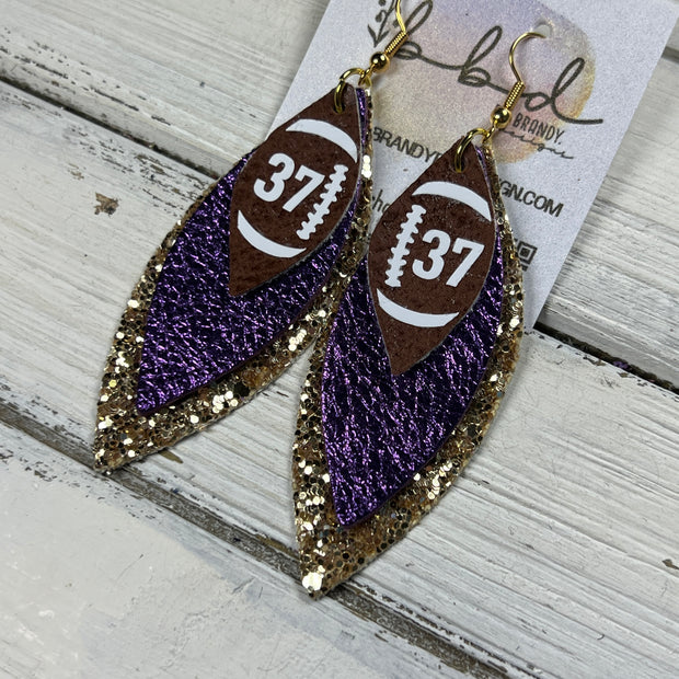 (CUSTOM) DOROTHY -  Leather Earrings  ||    <BR> BROWN (FAUX LEATHER) FOOTBALL WITH CUSTOM NUMBER,<BR>METALLIC PURPLE PEBBLED, <BR> GOLD GLITTER (FAUX LEATHER)