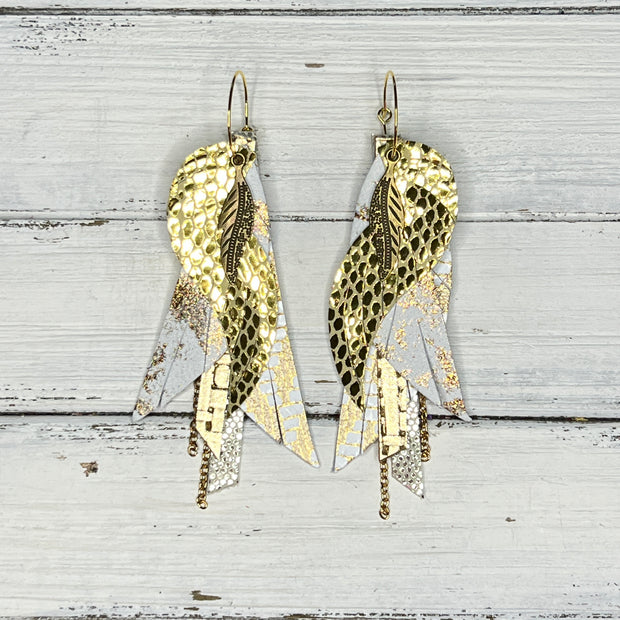 ROXY -  Leather Earrings  ||   <BR> FEATHER CHARM, <BR> METALLIC GOLD SCALES, <BR> GOLD AND WHITE NORTHERN LIGHTS, <BR> GOLD CHEVRON, <BR> METALLIC GOLD PANAMA WEAVE, <BR> METALLIC GOLD DOTS