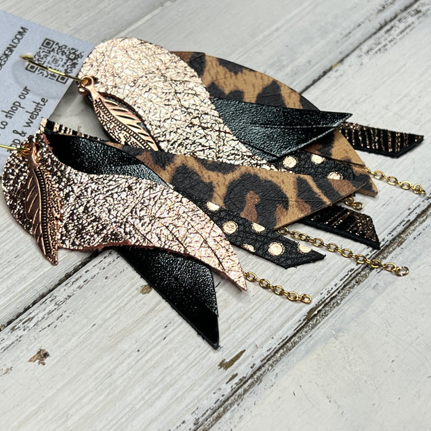 ROXY -  Leather Earrings  ||   <BR> FEATHER CHARM, <BR> METALLIC ROSE GOLD PEBBLED, <BR> METALLIC BLACK SMOOTH, <BR> LEOPARD PRINT, <BR> METALLIC ROSE GOLD POLKADOT, <BR> METALLIC ROSE GOLD WEBS