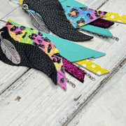 ROXY -  Leather Earrings  ||   <BR> FEATHER CHARM, <BR>MATTE BLACK, <BR>LISA F. PRINT, <BR> ROBINS EGG BLUE, <BR> SHIMMER MAGENTA, <BR> YELLOW & WHITE POLKADOT