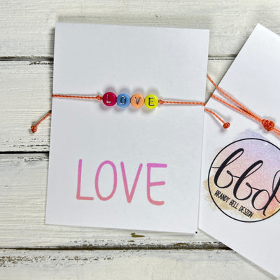 INSPIRATIONAL BRACELET - Handmade by Brandy Bell Design <br> Adjustable Waxed Cotton  "LOVE" (coral)