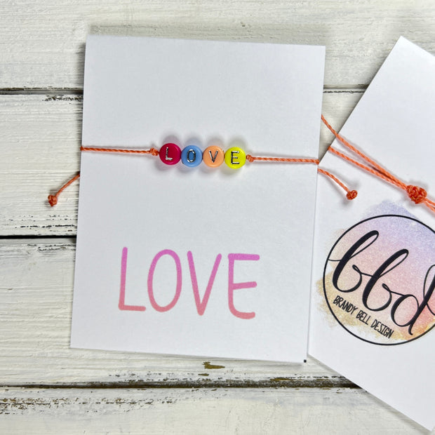 INSPIRATIONAL BRACELET - Handmade by Brandy Bell Design <br> Adjustable Waxed Cotton  "LOVE" (coral)