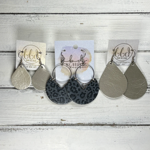ERIN  - Leather Earrings   ||  <BR> MUSTARD FLORAL OUTLINES (LEATHER ON CORK)
