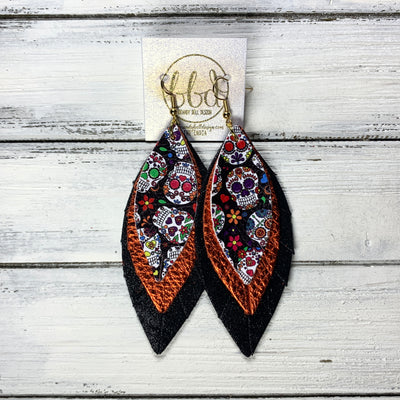 INDIA - Leather Earrings   ||  <BR> FANCY SUGAR SKULLS (FAUX LEATHER),  <BR> METALLIC ORANGE PEBLED, <BR> SHIMMER BLACK