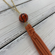 TASSEL NECKLACE - TIFFANIE      ||  RUST TASSEL WITH BASKETBALL DECORATIVE BEAD