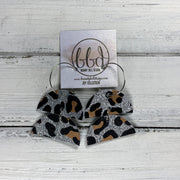 JOY - Leather Earrings  ||    <BR> SILVER GLITTER ANIMAL PRINT PATTERN ON CORK