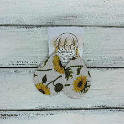 ZOEY (3 sizes available!) -  Leather Earrings  ||   SUNFLOWERS ON WHITE (FAUX LEATHER) <BR> *pattern placement will vary*