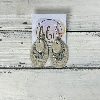 DIANE -  Leather Earrings  ||   <BR> PEARL WHITE, <BR> CHAMPAGNE SHIMMER SPOTS, <BR> IVORY BRAID