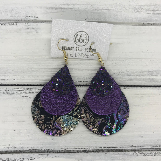LINDSEY - Leather Earrings  ||  <BR> WICKED WITCH GLITTER (NOT REAL LEATHER), <BR> METALLIC PURPLE PEBBLED, <BR> IRIDESCENT PAISLY ON BLACK