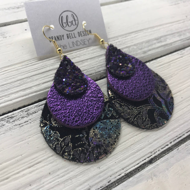 LINDSEY - Leather Earrings  ||  <BR> WICKED WITCH GLITTER (NOT REAL LEATHER), <BR> METALLIC PURPLE PEBBLED, <BR> IRIDESCENT PAISLY ON BLACK
