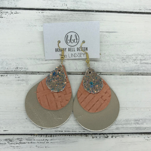 LINDSEY - Leather Earrings  ||  <BR> GLAMOUR GLITTER (NOT REAL LEATHER), <BR> SALMON PANAMA WEAVE, <BR> METALLIC CHAMPAGNE SMOOTH