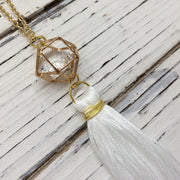 TASSEL NECKLACE - CAROLINA  || WHITE TASSEL WITH GOLD CAGE WITH ENCLOSED GEM