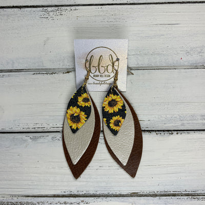 DOROTHY - Leather Earrings  ||  <BR> SUNFLOWERS ON BLACK,  <BR> CHAMPAGNE PEARL,  <BR> DISTRESSED BROWN